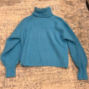 Blue turtleneck sweater
